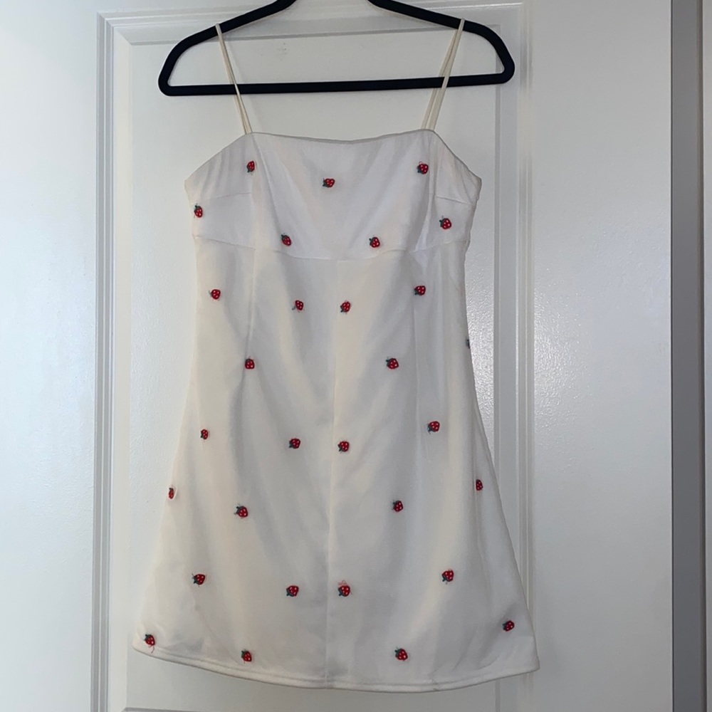 White mini dress with strawberry detailing